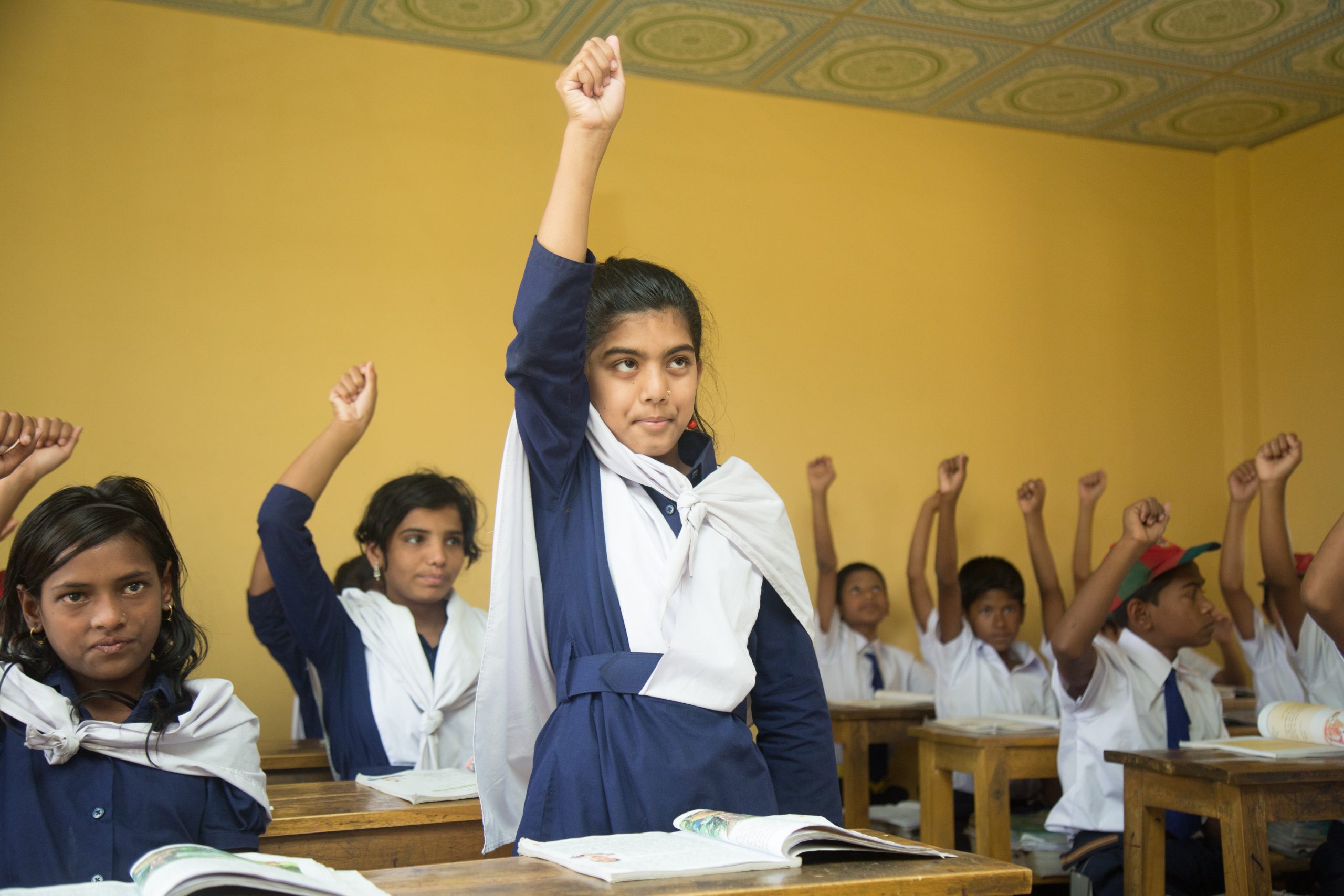 Children participating in a classroom lesson