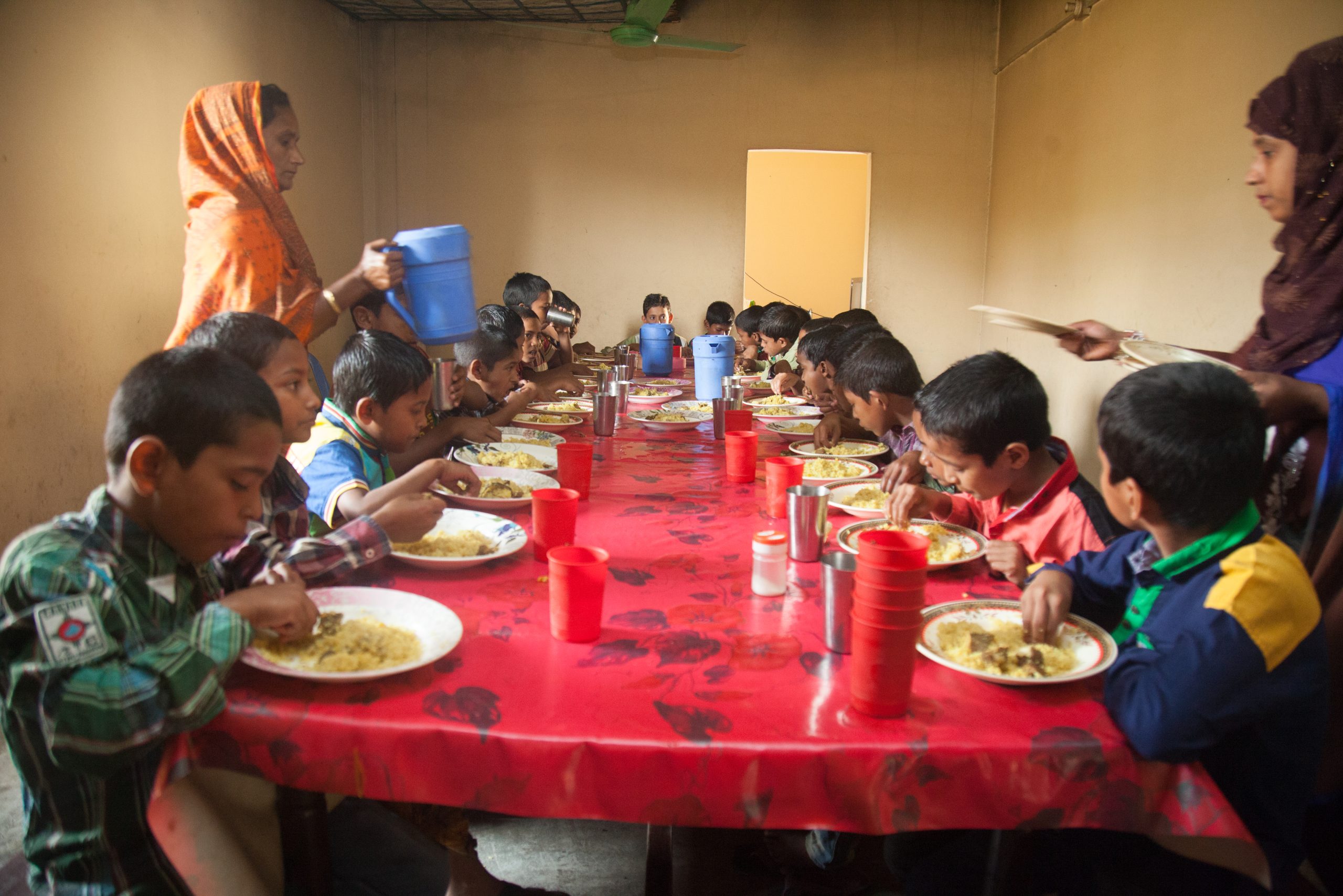 Children sharing a meal at Hope and Prosperity